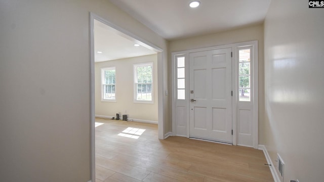 entrance foyer with light hardwood / wood-style flooring