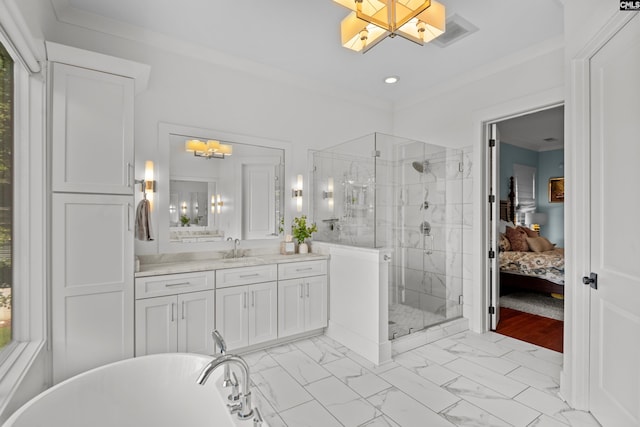 bathroom featuring shower with separate bathtub, vanity, a wealth of natural light, and ornamental molding