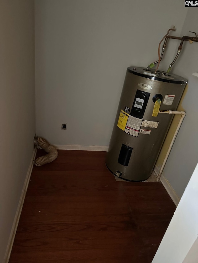 utility room with electric water heater