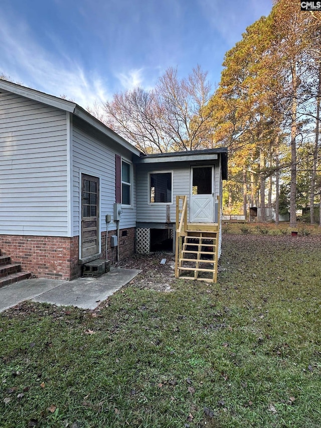 back of property with a patio area