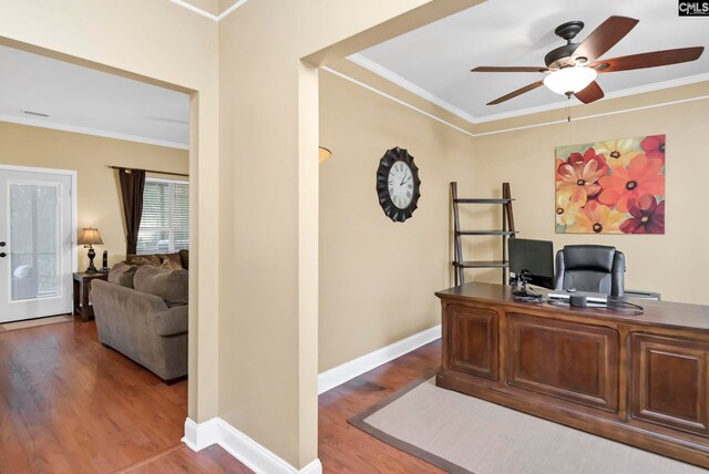 office featuring crown molding, hardwood / wood-style floors, and ceiling fan