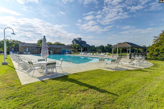 view of pool featuring a gazebo, a yard, and a patio