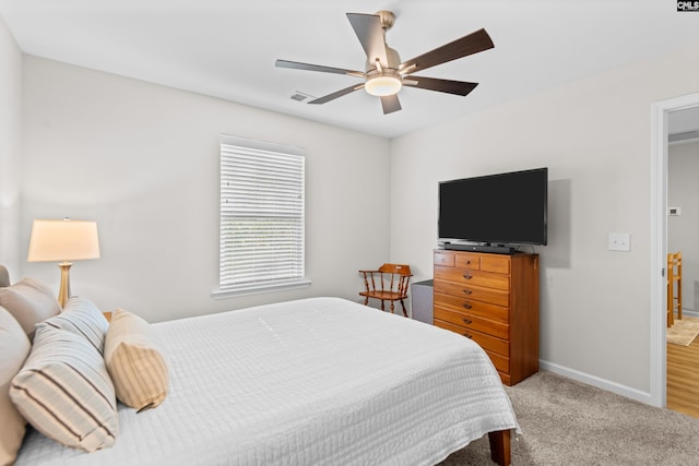 bedroom featuring ceiling fan and carpet floors