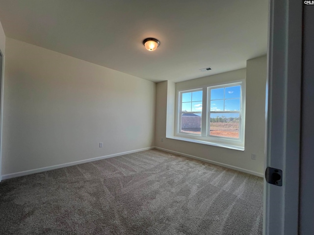 unfurnished room with carpet