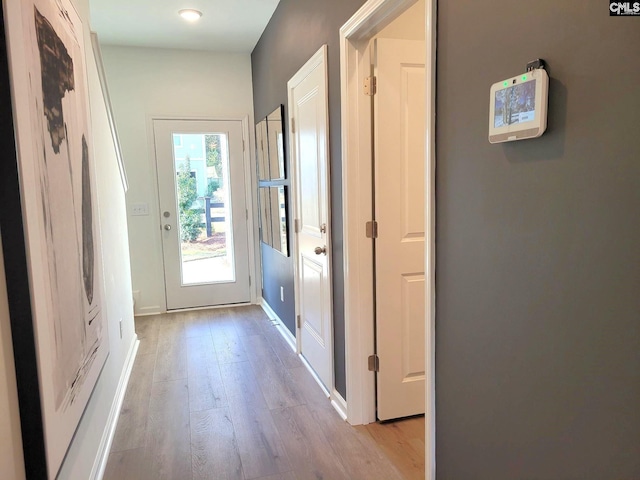 doorway featuring light wood-type flooring