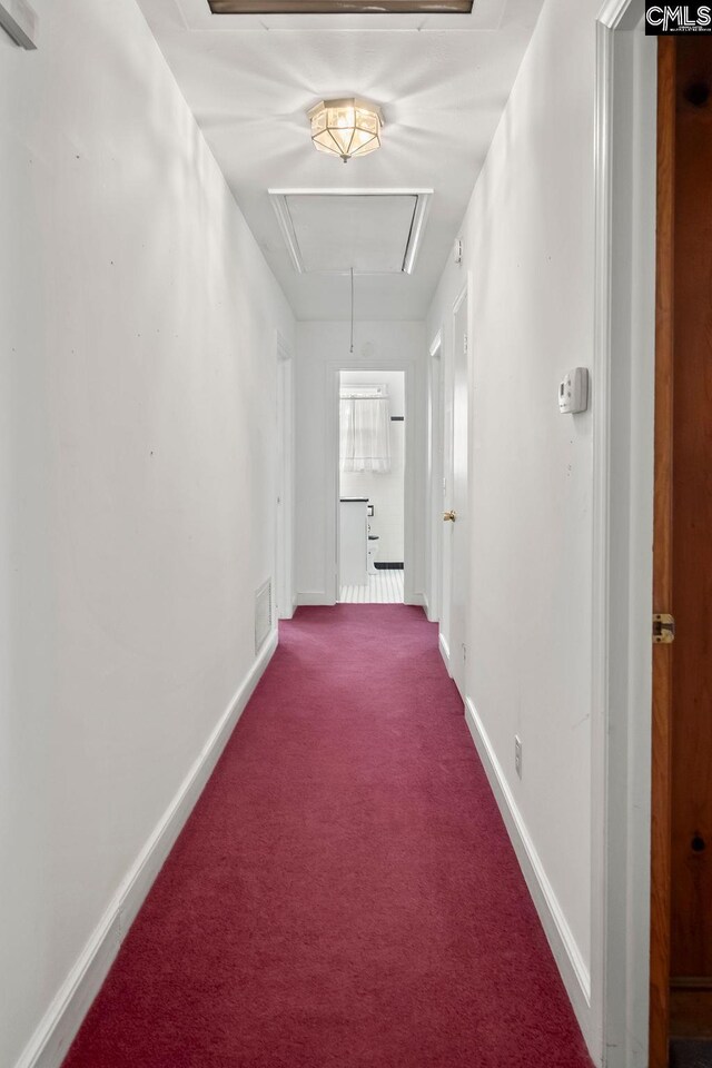 corridor featuring carpet