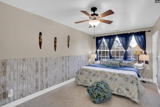 bedroom featuring ceiling fan and carpet floors