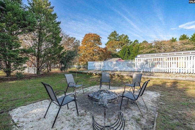 view of patio with a fire pit