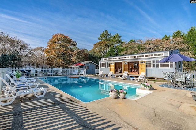 view of pool featuring a patio