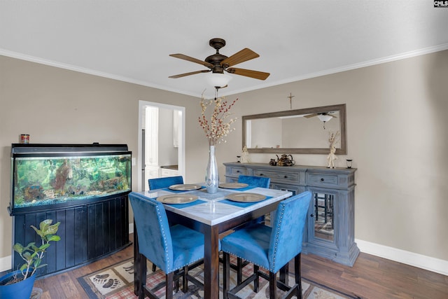 dining room featuring hardwood / wood-style flooring, ceiling fan, and ornamental molding