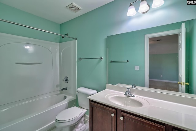 full bathroom with toilet, vanity, and tub / shower combination