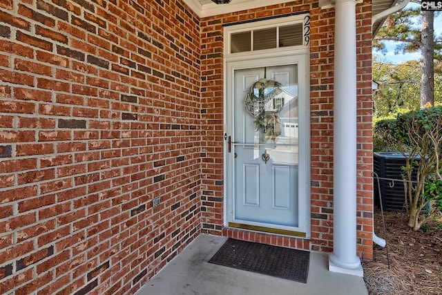 entrance to property with central AC unit