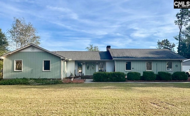 ranch-style home featuring a front yard