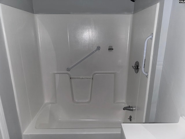 bathroom with shower / bath combination