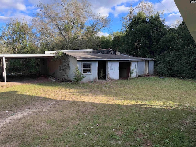 single story home with a carport and a front yard