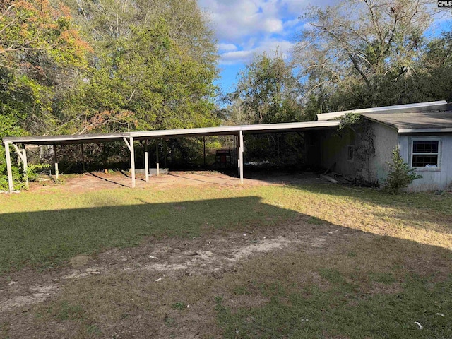 view of yard featuring a carport