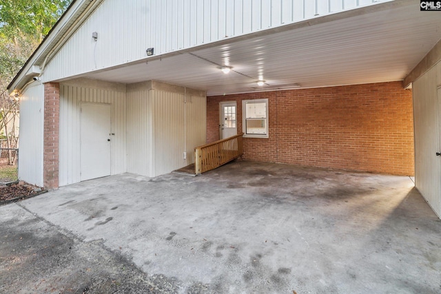 garage featuring a carport