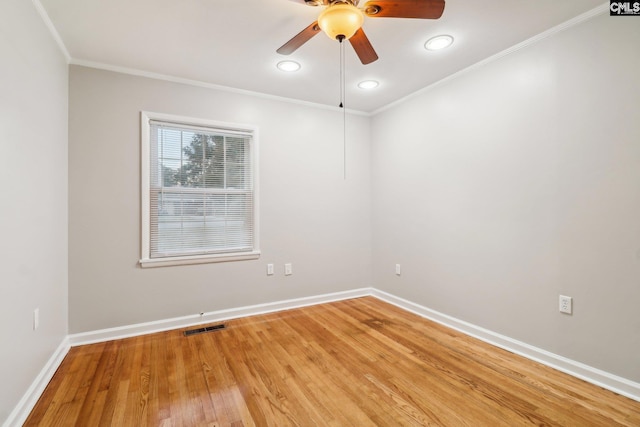 unfurnished room with crown molding, ceiling fan, and hardwood / wood-style flooring