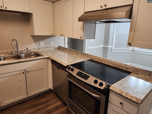 kitchen featuring sink, dark wood-type flooring, and appliances with stainless steel finishes