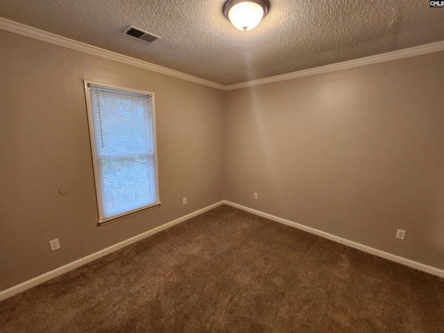 spare room with carpet flooring, a textured ceiling, a wealth of natural light, and crown molding