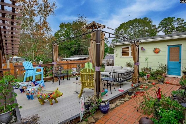 wooden deck featuring an outdoor living space