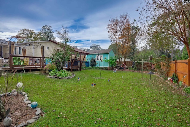 view of yard featuring a deck