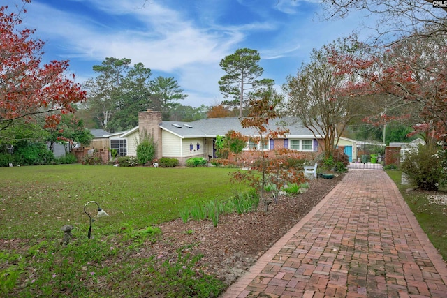 exterior space with a front yard