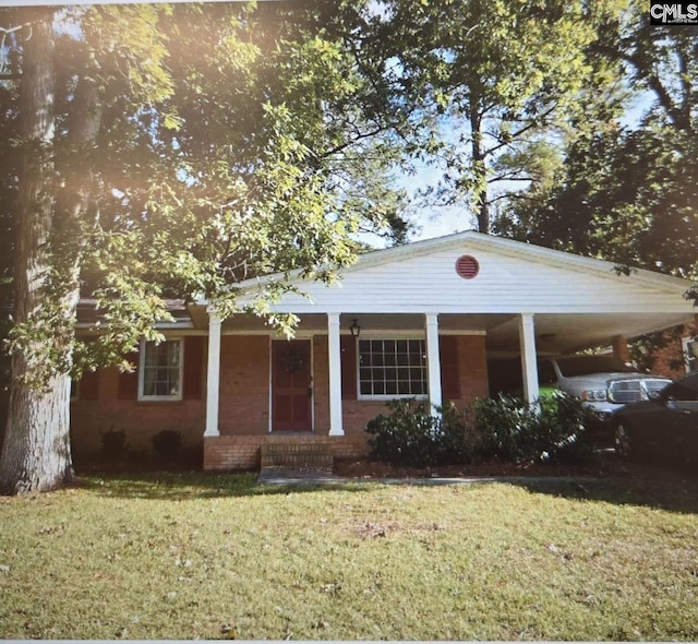 view of front of house with a front yard and a porch