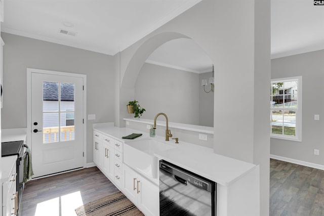 interior space with kitchen peninsula, crown molding, black appliances, white cabinets, and dark hardwood / wood-style floors