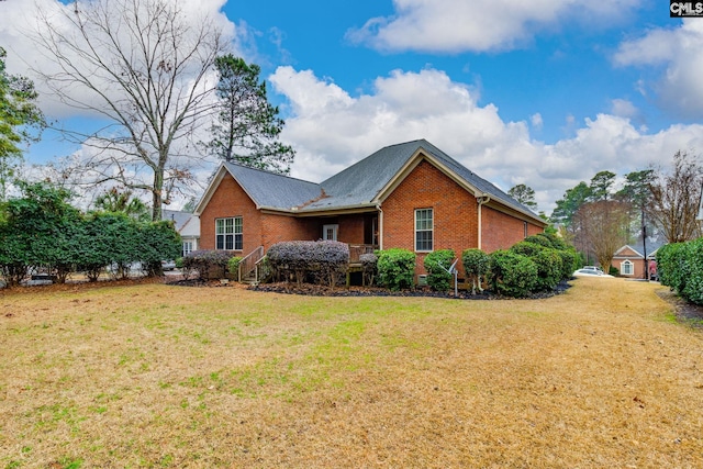 view of front of home with a front yard