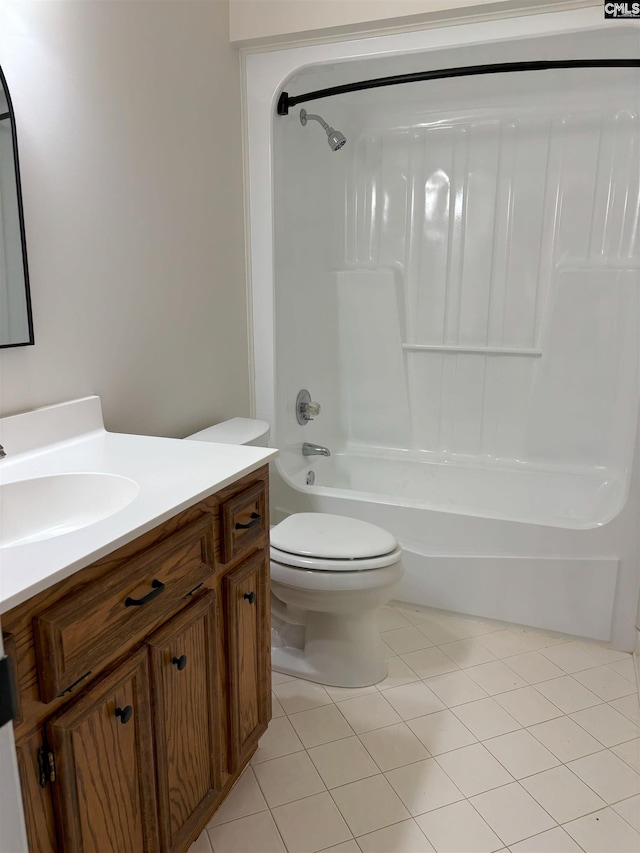 full bathroom featuring toilet, vanity, bathing tub / shower combination, and tile patterned floors