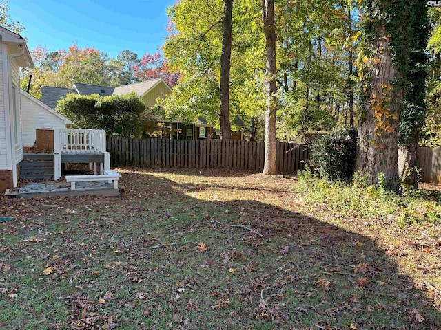 view of yard with a deck