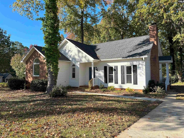 ranch-style house featuring a front lawn