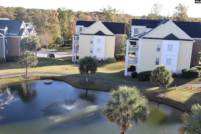 exterior space with a water view