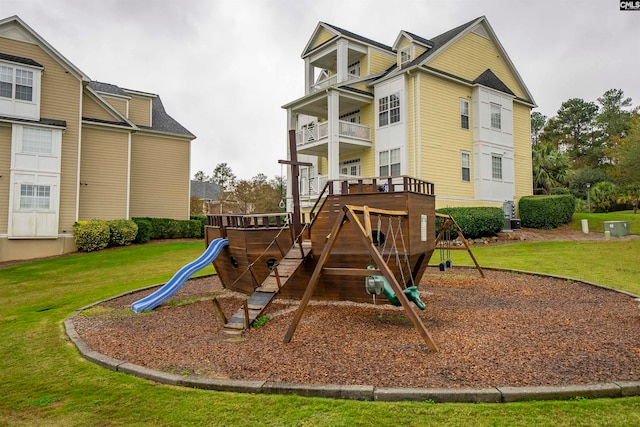 view of playground with a yard