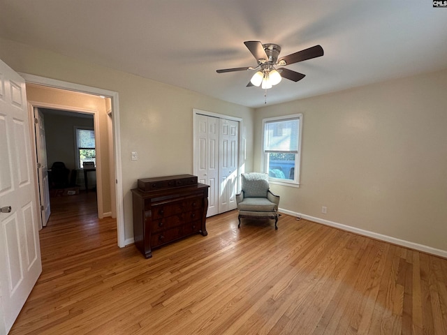 unfurnished room with ceiling fan and light hardwood / wood-style flooring