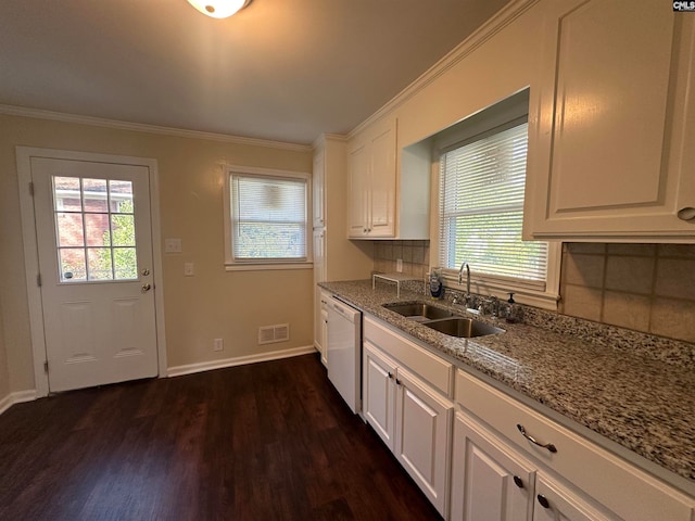 kitchen with dishwasher, sink, dark wood-type flooring, crown molding, and white cabinets