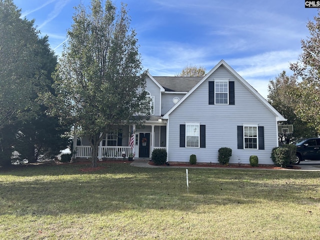 view of front facade featuring a porch and a front yard