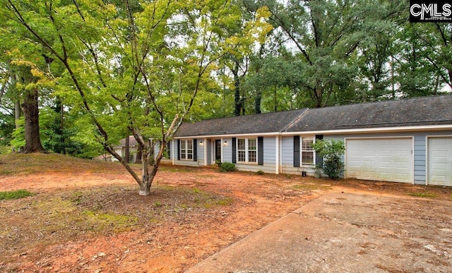 single story home with a garage