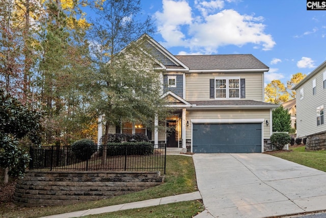 craftsman-style home with a garage