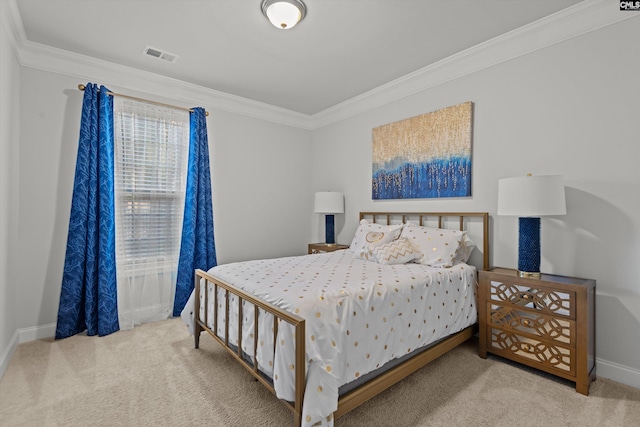 carpeted bedroom featuring ornamental molding