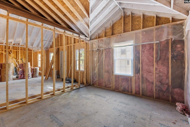 misc room with lofted ceiling