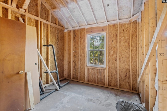 interior space featuring vaulted ceiling