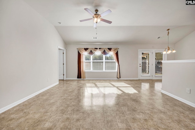 unfurnished living room with ceiling fan with notable chandelier, light hardwood / wood-style flooring, and lofted ceiling