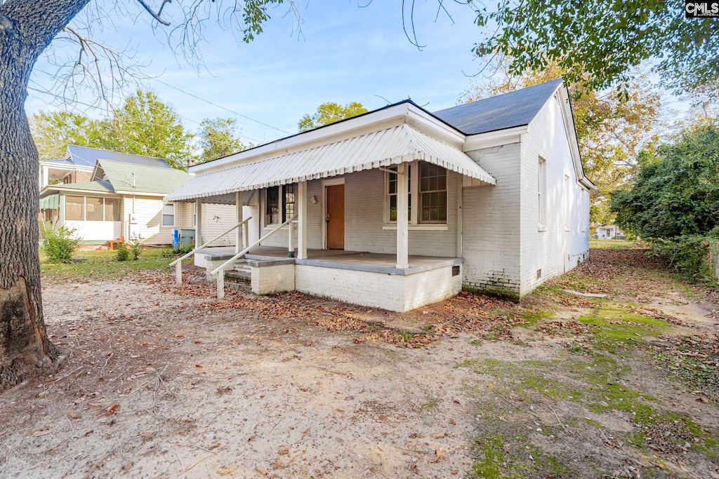 bungalow-style home featuring a porch