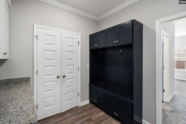 mudroom with dark hardwood / wood-style floors and ornamental molding