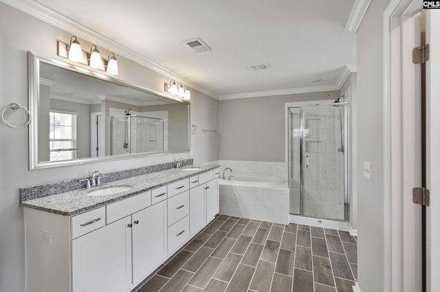 bathroom with hardwood / wood-style flooring, vanity, separate shower and tub, and crown molding