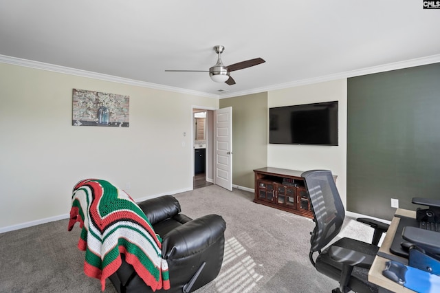 office space with carpet floors, ceiling fan, and crown molding