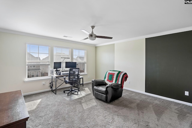 carpeted office space with ceiling fan and crown molding