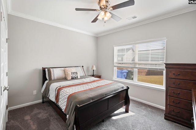 bedroom featuring dark colored carpet, ceiling fan, and ornamental molding